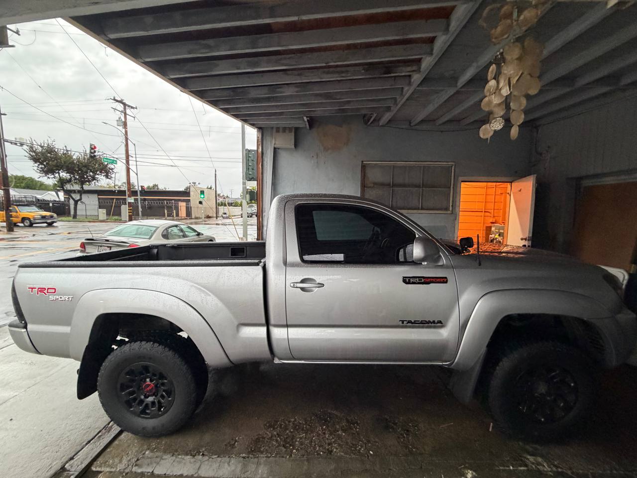Silver Toyota Tacoma TRD Sport — side view